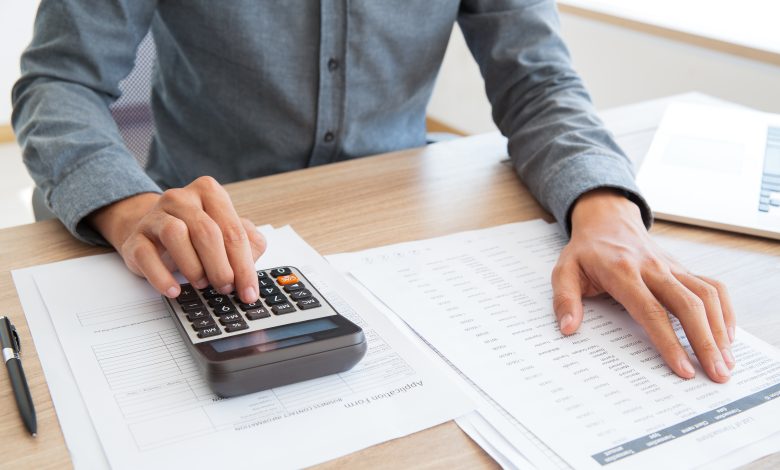 checking workplace table counting man