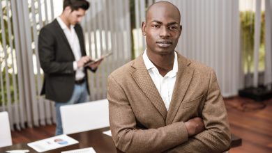 close up of calm businessman calm with crossed arms