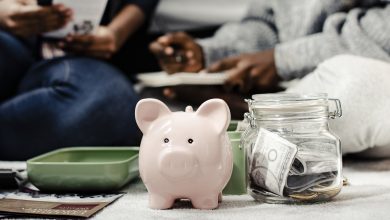 mother teaching her daughter about savings